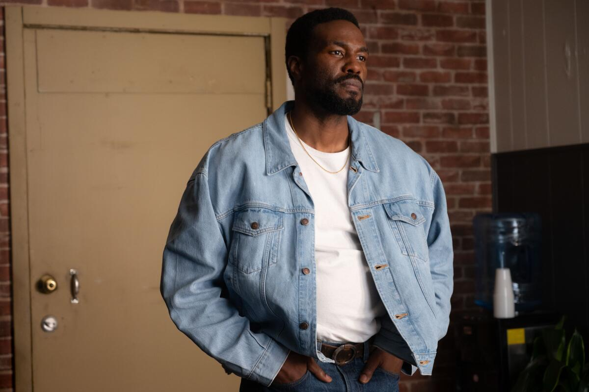 Wonder Man Yahya Abdul-Mateen II Stonewashed Finish and Button-Tab Waistband Light Wash Denim Trucker Jacket