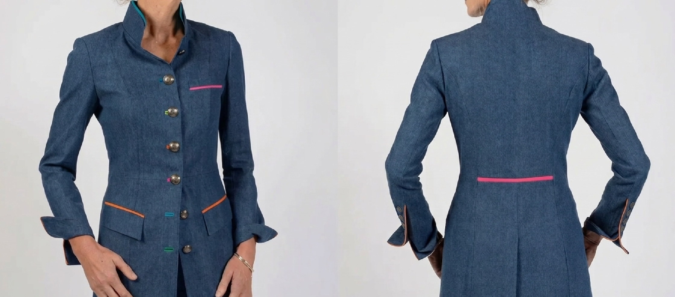 Clare Balding wearing the Clare Balding denim jacket today by Beatrice von Tresckow, featuring a long straight silhouette, jewel neckline with mandarin collar, silver buttons with red, yellow, and blue accents, and vibrant pink and yellow lining.