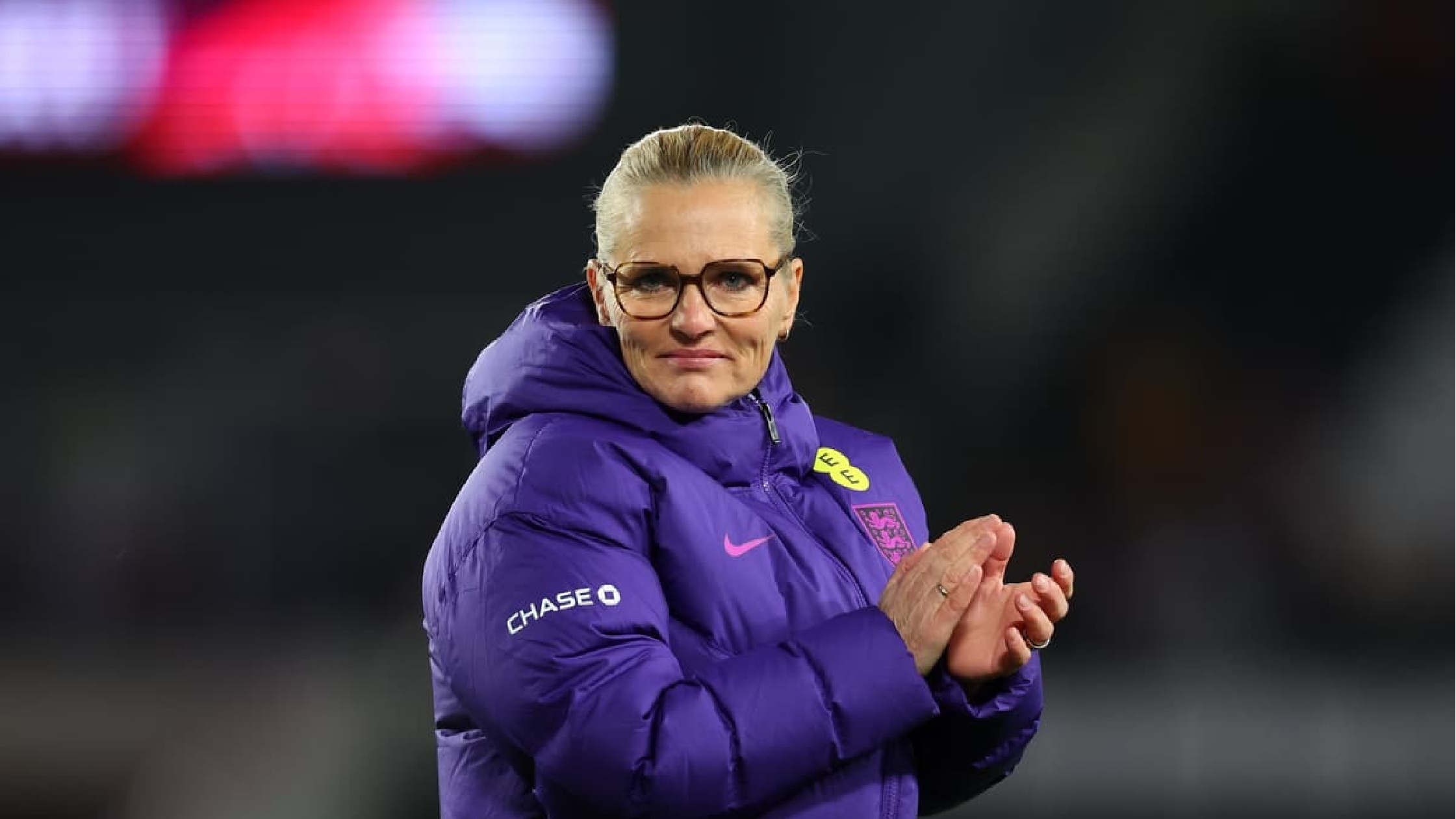 Sarina Wiegman, head coach of the England Lionesses, wearing a Nike purple hooded puffer jacket on the sidelines during the FIFA Women’s World Cup Group 3 qualifier against Iceland in Nottingham, England.