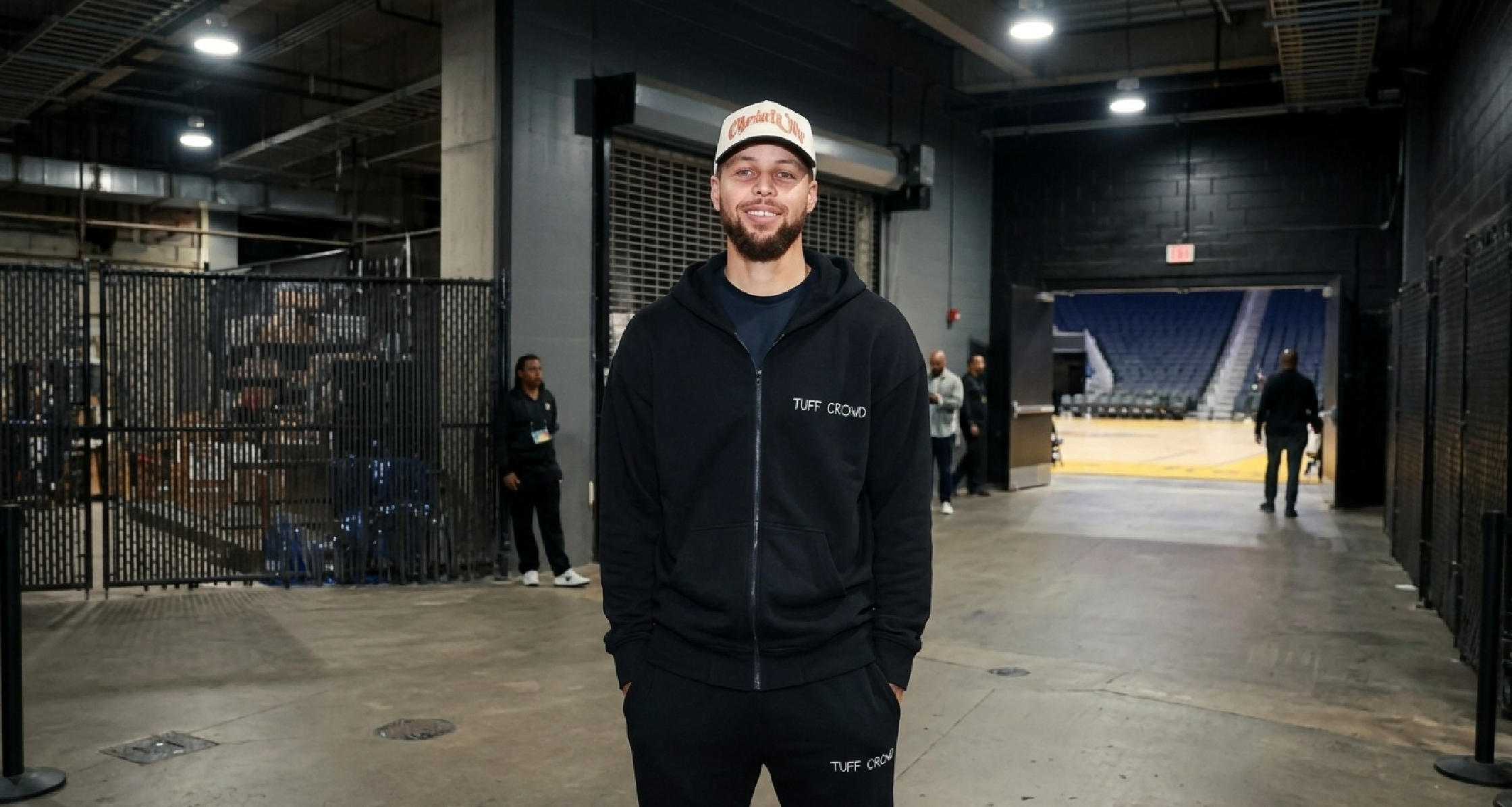 Stephen Curry wearing the NBA 2025 Black Hoodie by Tuff Crowd during pre-game tunnel walk