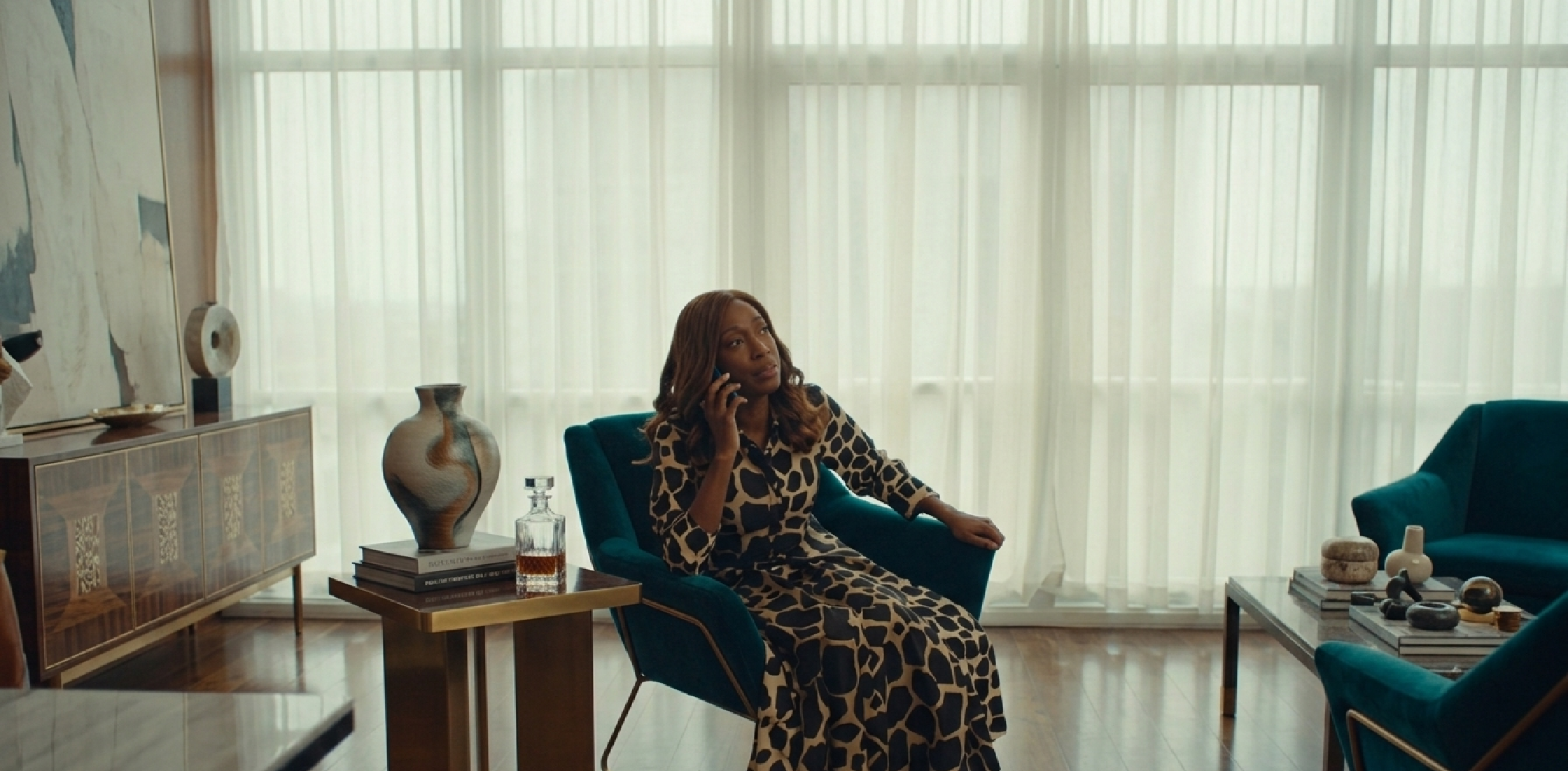 Nikki Amuka-Bird wearing a giraffe print Max Mara Arabba midi shirt dress in I Jack Wright