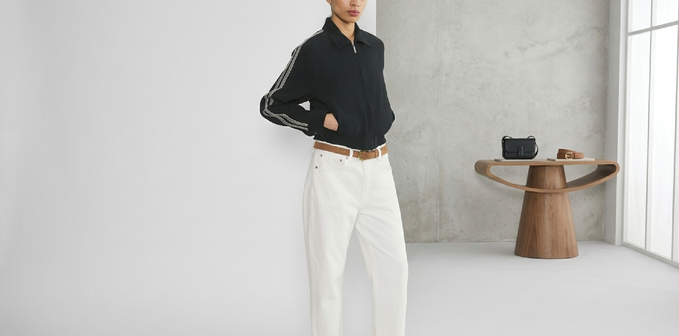 Hudson & Rex S08 Sarah Truong black bomber jacket with white striped sleeves