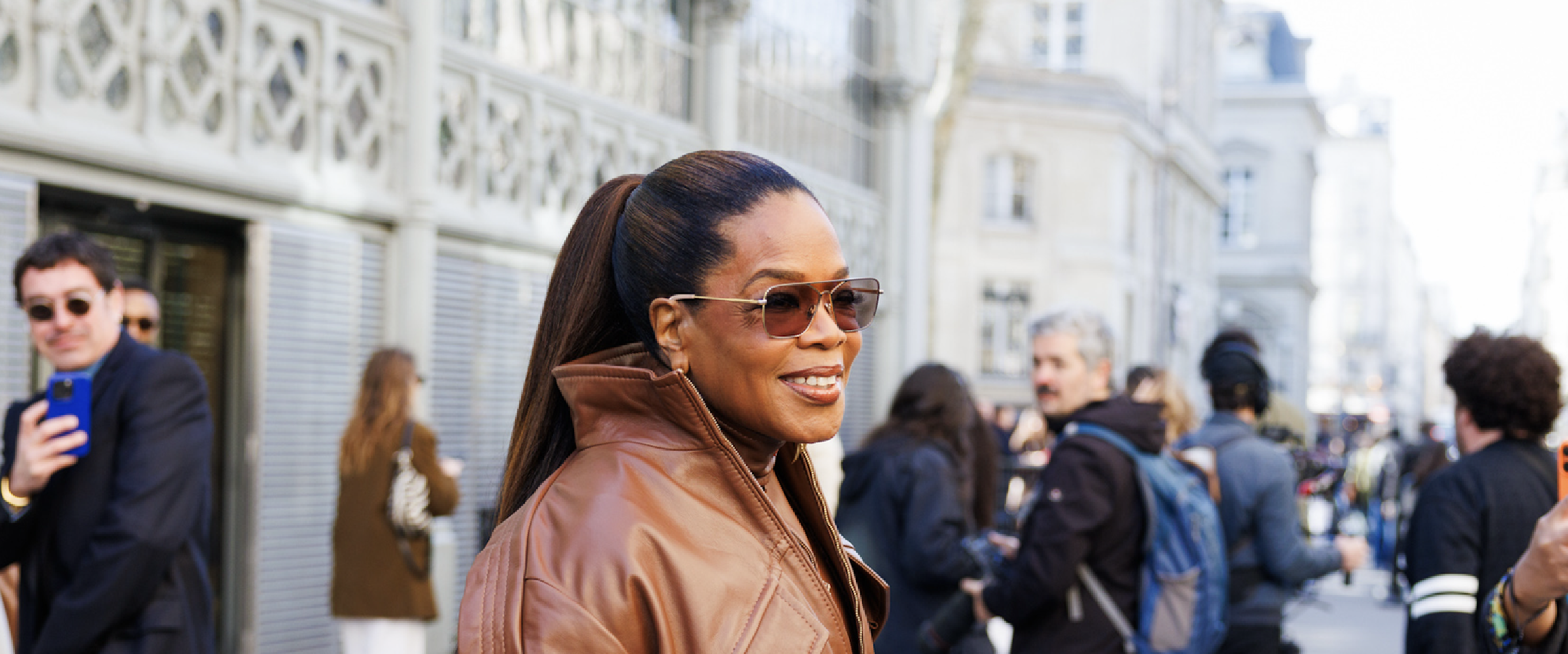 Oprah Winfrey Paris Fashion Week 2026 cognac leather jacket with balloon sleeves and funnel collar