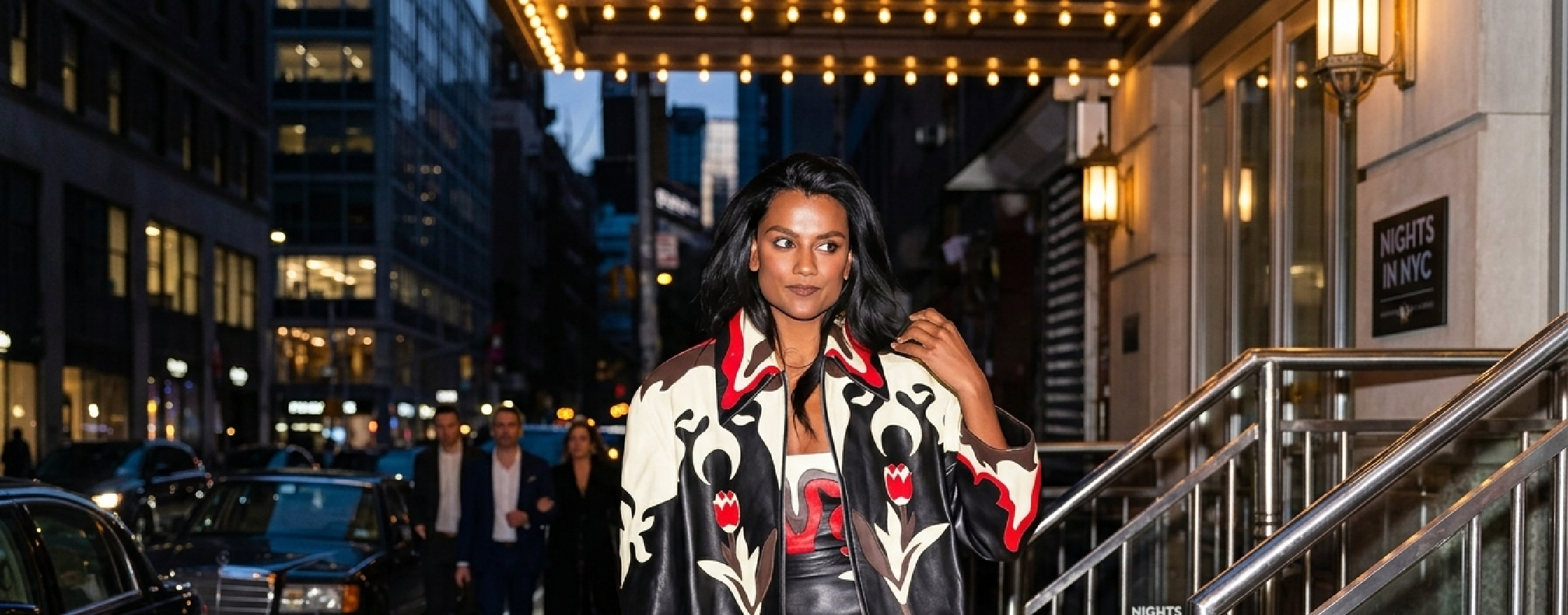Simone Ashley Tashca NYC 2026 black leather jacket with Western-gothic tulip appliqués and red floral cut-out motifs