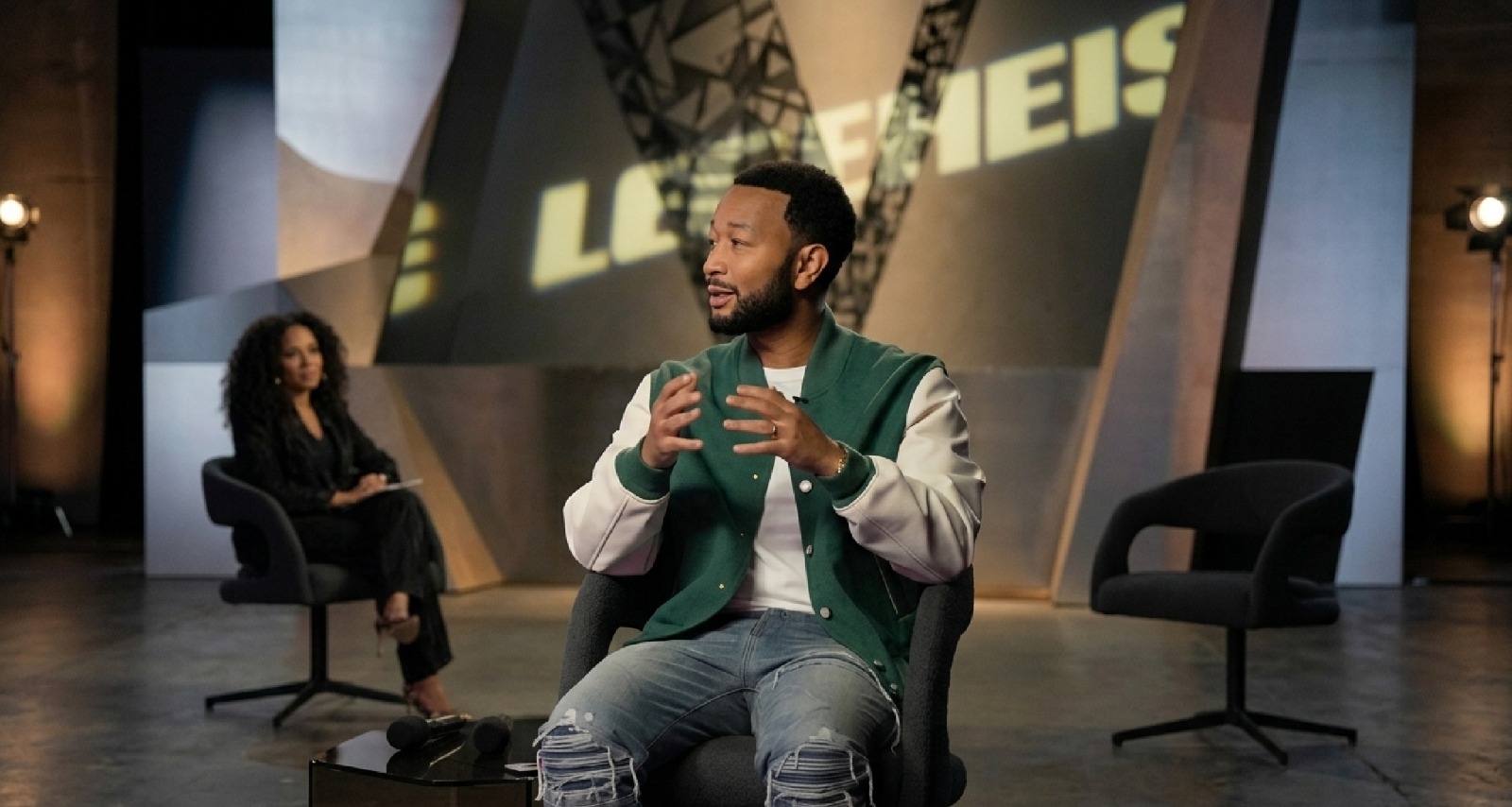 The Voice S29 John Legend green varsity jacket with cream sleeves and snap button front