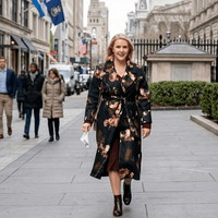 Karoline Leavitt wearing black floral wrap coat with self-tie waist on The Today Show 2026