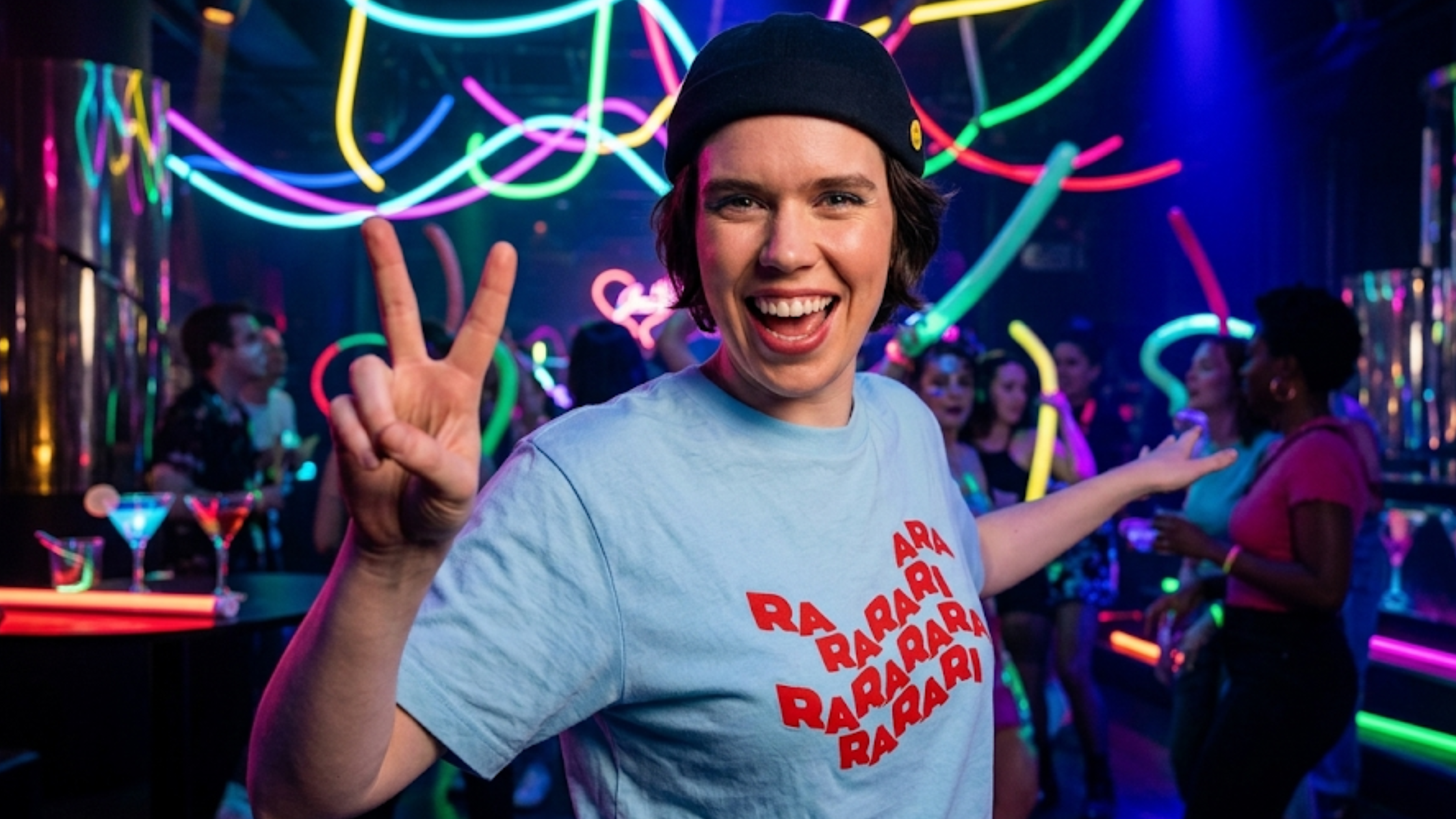 How to Get to Heaven from Belfast S01 Dara Light Blue Graphic Tee with Wavy Red DARARI Text