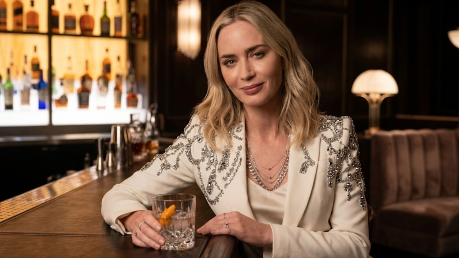 Pain Hustlers 2023 Emily Blunt white crystal embellished blazer with silver brooch detailing and structured shoulders