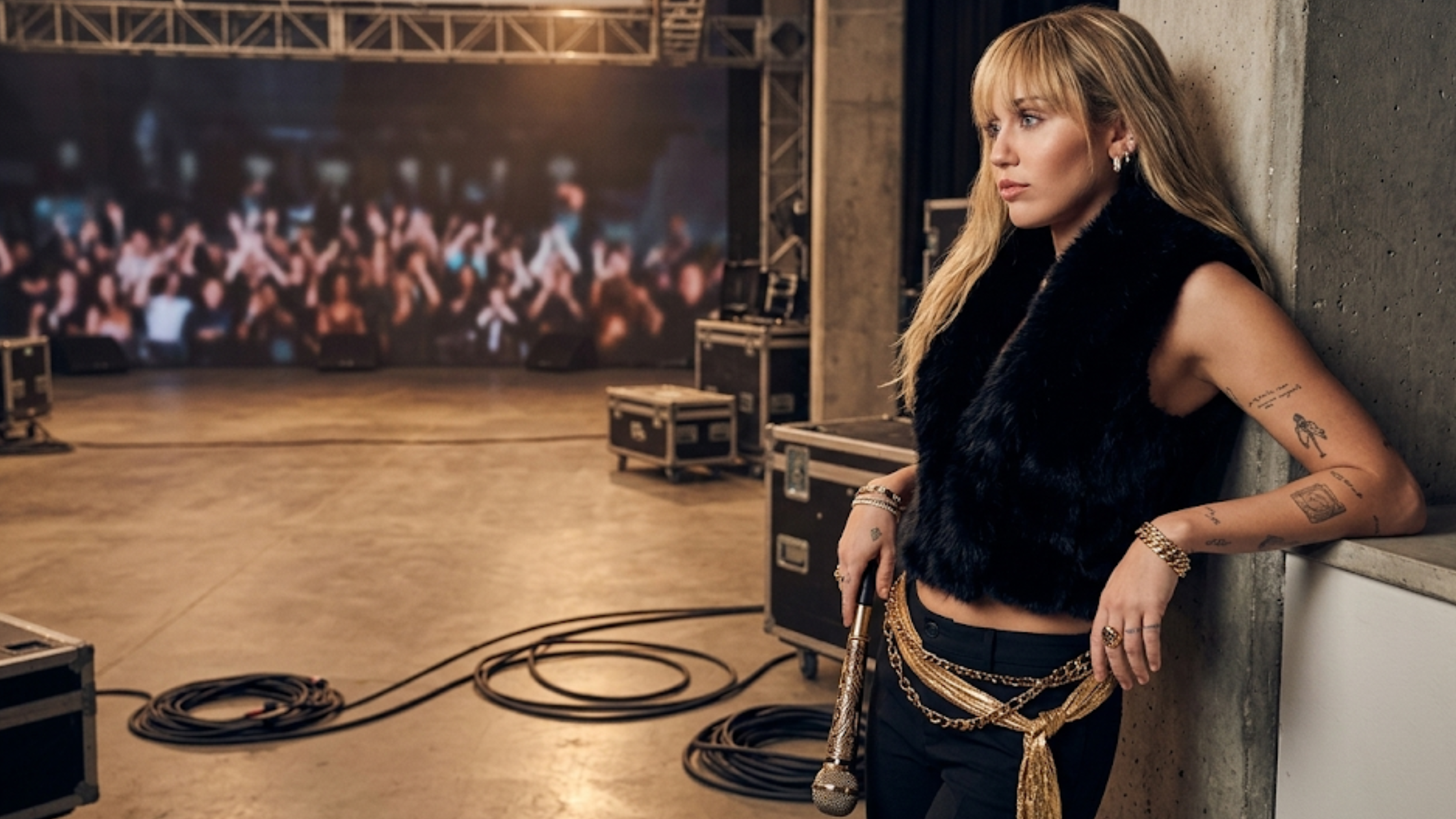 Miley Cyrus Hannah Montana 20th Anniversary black faux fur cropped vest with oversized lapel design