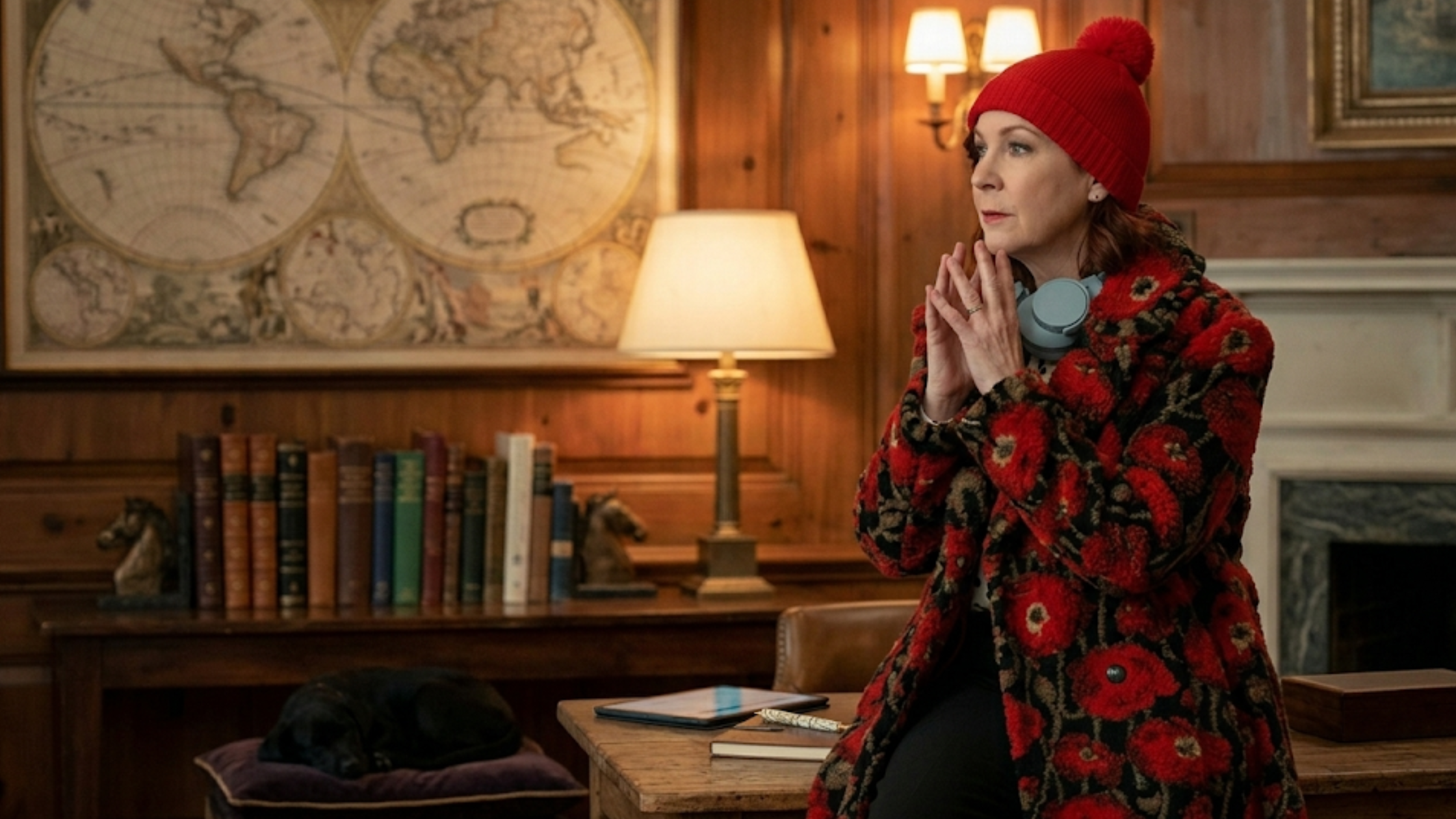 Elsbeth Season 03 Carrie Preston black faux fur floral coat with red poppy print, sherpa texture, and knee-length design