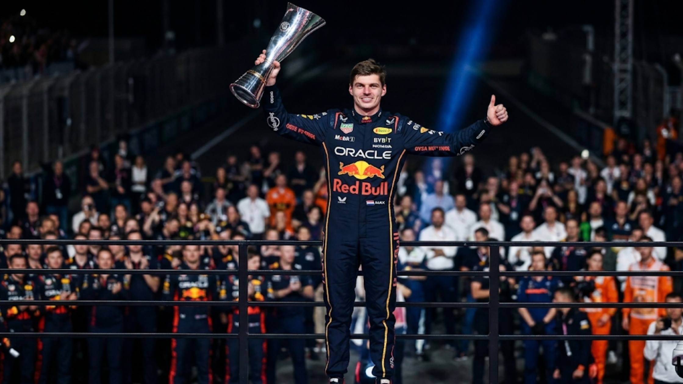 Max Verstappen F1 Las Vegas navy blue racing jumpsuit with yellow piping and Oracle Red Bull Racing sponsor logos
