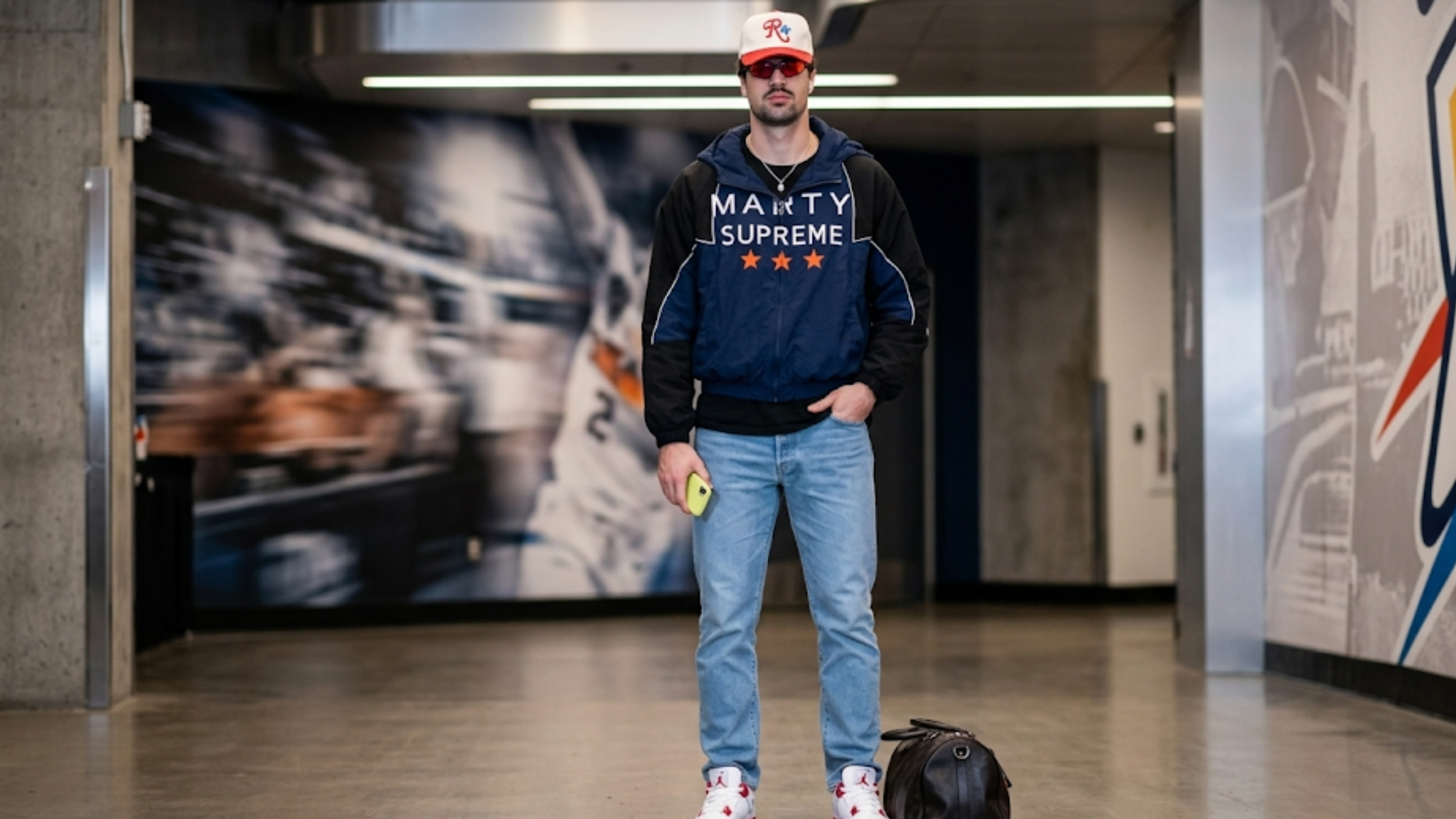 Deni Avdija Spurs Vs Trail Blazers 2026 Marty Supreme orange star color-block jacket with navy hood and white piping streetwear design