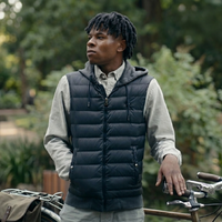 Patrick Burrowes Criminal Record black vest with hood, quilted front, and sleek urban streetwear design