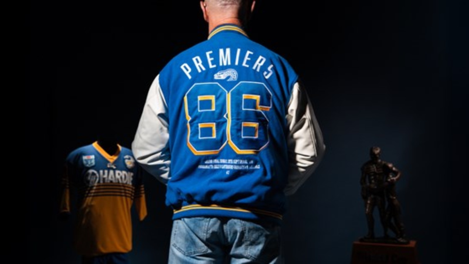 Parramatta Eels 1986 Premiers blue and white varsity jacket with gold anniversary embroidery and championship tribute detailing