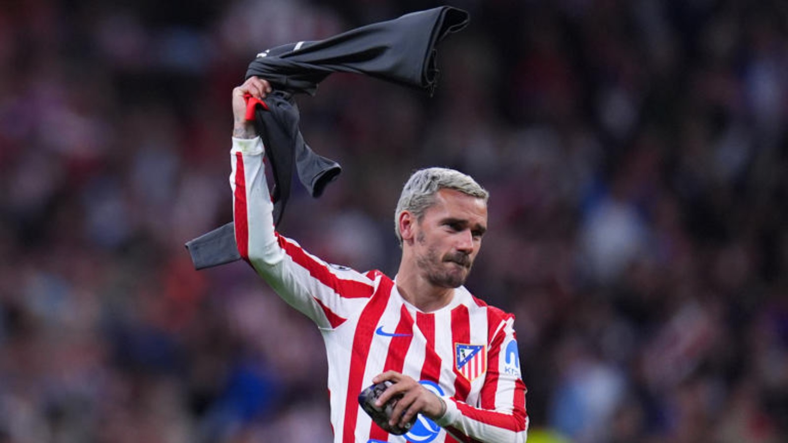 Antoine Griezmann FC Barcelona vs Atletico de Madrid red and white striped long sleeve jersey with Riyadh Air sponsor and GRIEZMANN 7 detailing