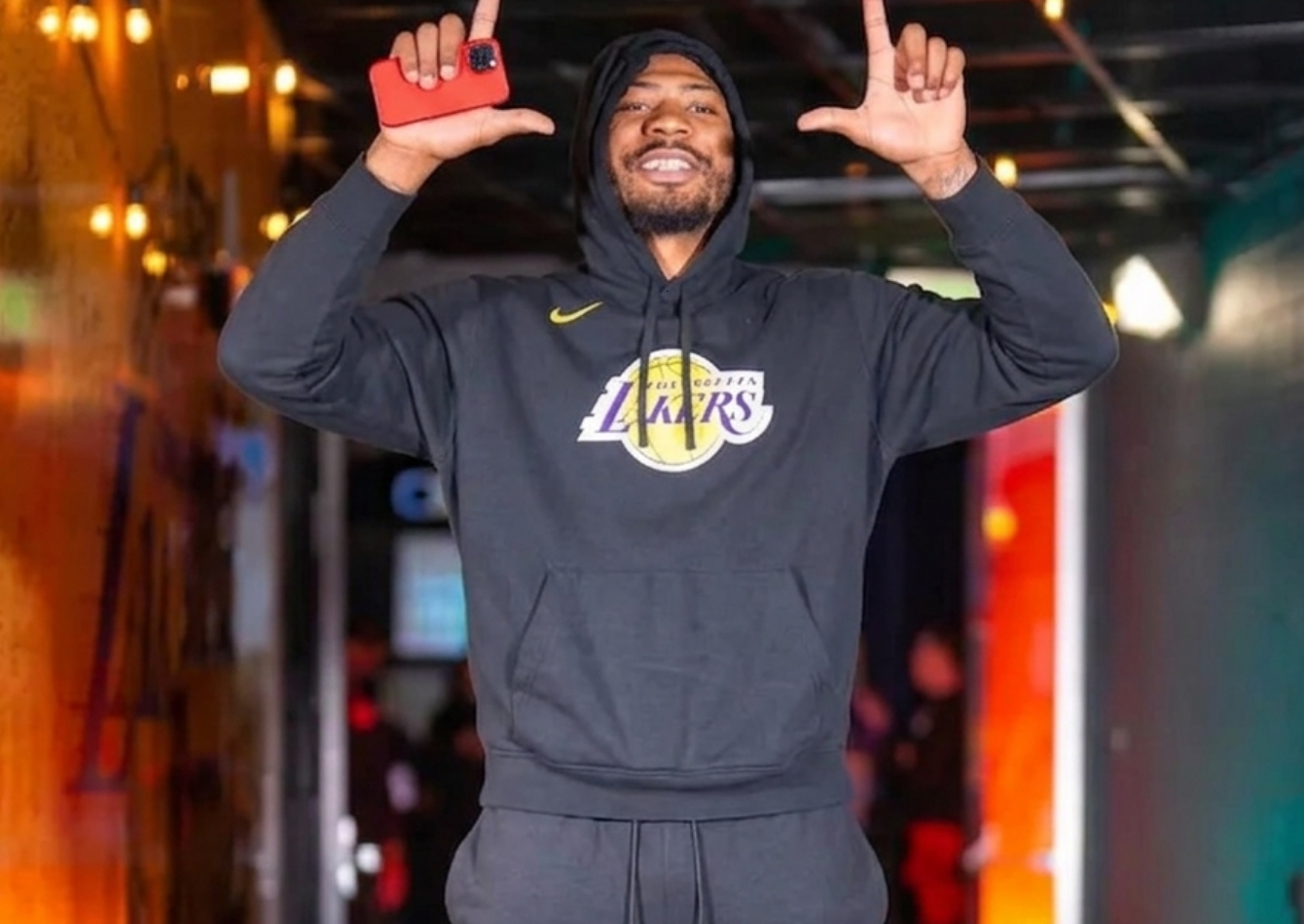 Marcus Smart wearing a black Los Angeles Lakers hoodie with purple and gold logo and Nike swoosh during Houston Rockets vs Lakers game arrival