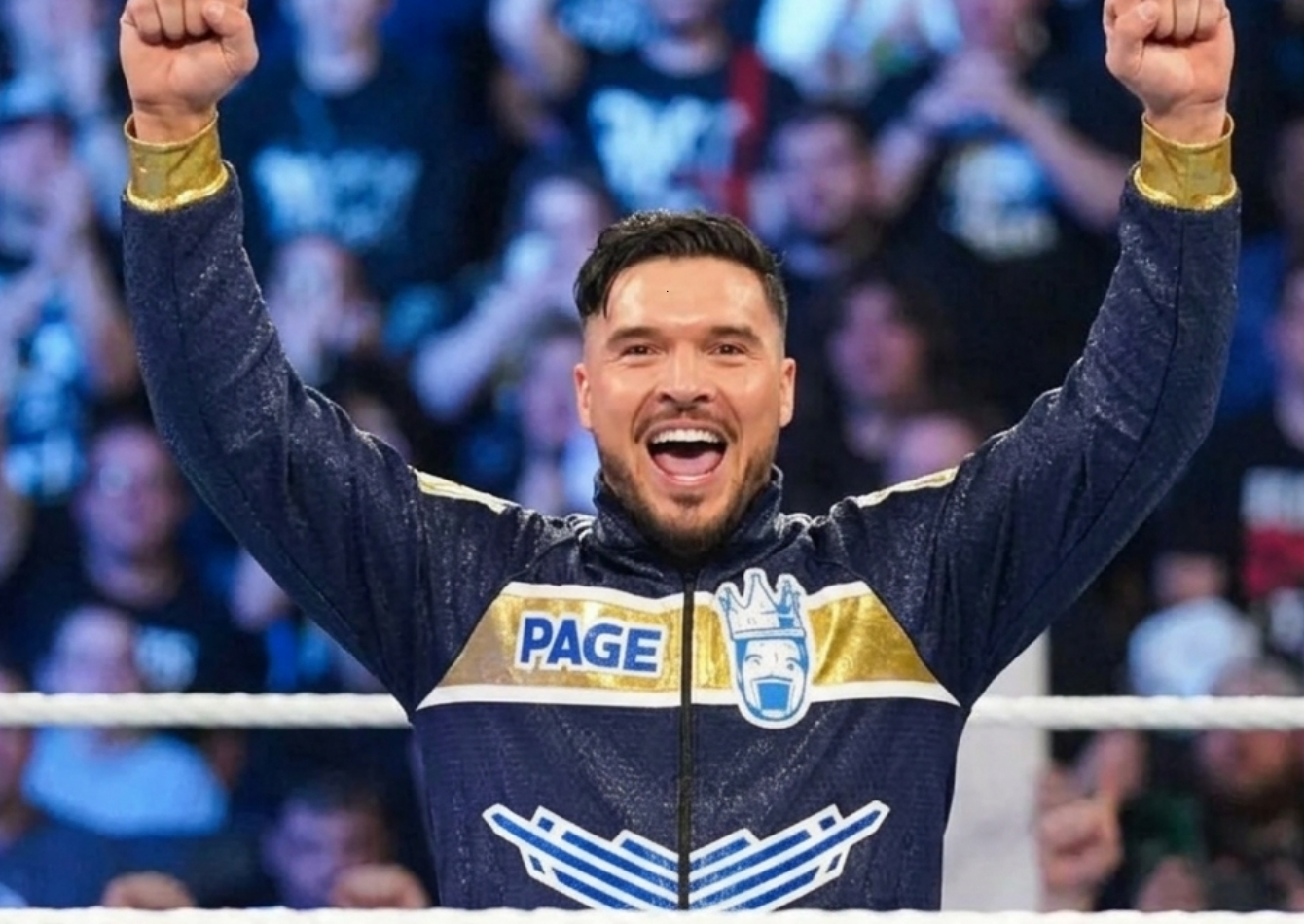 Ethan Page wearing a navy blue honeycomb-textured track jacket with gold and white accents during WWE Monday Night RAW April 2026 debut