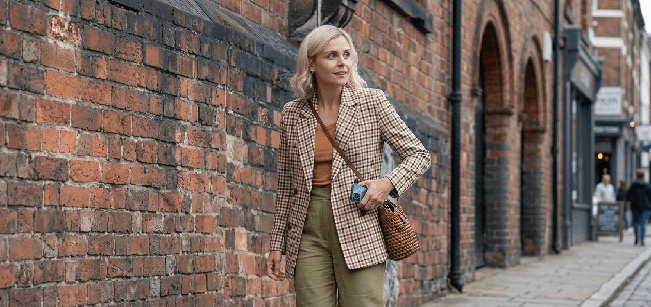 Denise Gough check blazer from The Stolen Girl 2025 with oversized fit and earthy plaid pattern