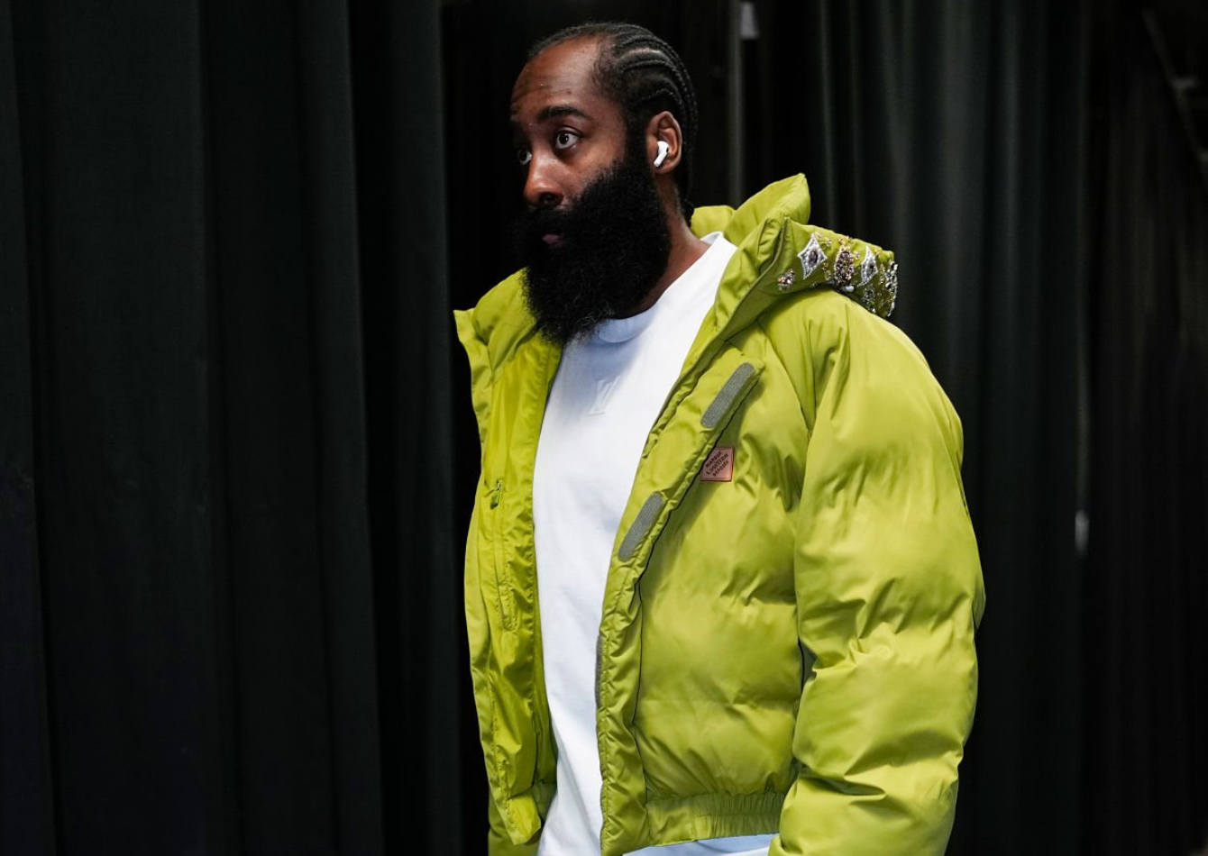 James Harden wearing a lime green oversized puffer jacket with burgundy wide-leg pants and white t-shirt during Cavaliers vs Raptors 2026 NBA Playoffs tunnel walk
