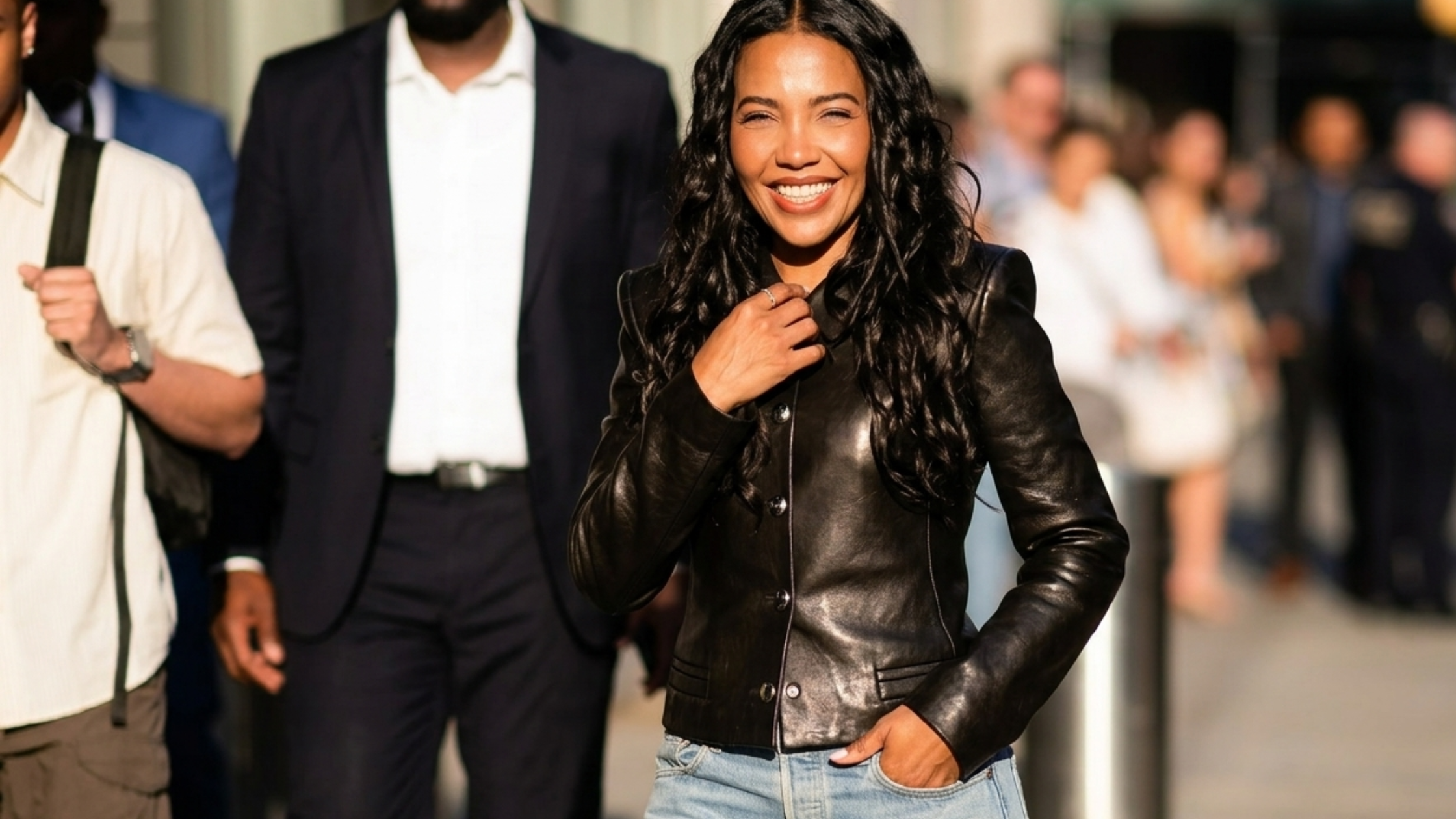Emma Grede NYC 2026 black sculpted leather jacket with structured shoulders, nipped waist, and silver button detailing