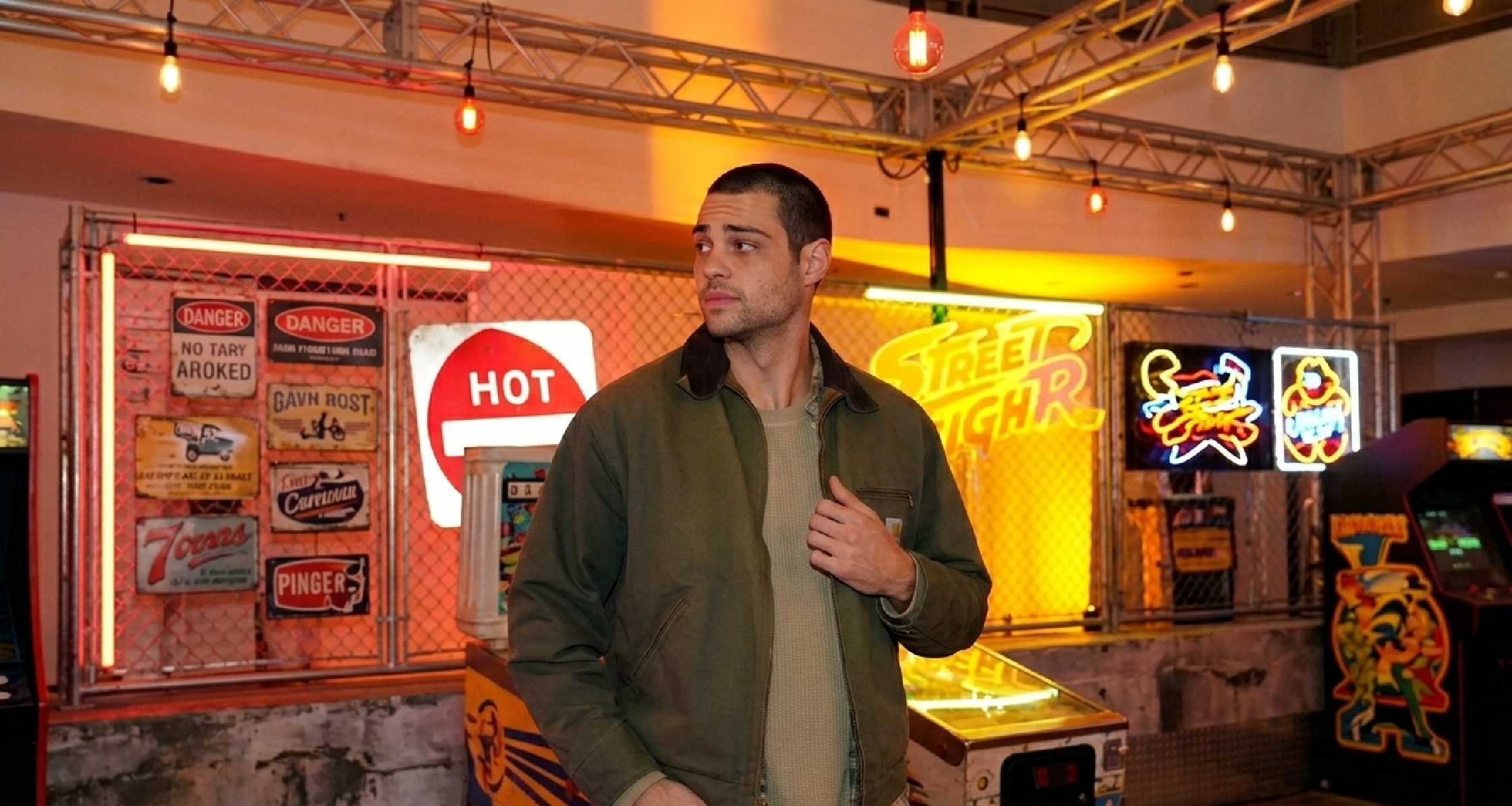 Noah Centineo wearing green Detroit canvas jacket at Street Fighter trailer launch event
