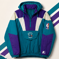 “Charlotte Hornets Starter jacket in teal, purple, and white with embroidered NBA logos, mascot detail, quarter-zip, hood, and oversized 90s style.”