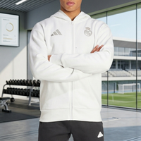 Real Madrid Anthem white Adidas zip-up jacket with silver branding, minimalist crest detailing, and clean athletic streetwear styling