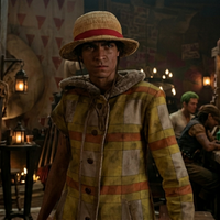 Monkey D. Luffy One Piece S02 oversized yellow plaid hooded jacket with sherpa-lined hood inspired by Iñaki Godoy’s live-action anime fashion style
