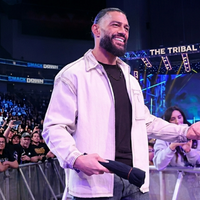 Roman Reigns wearing WWE World Opening Street Fighter-inspired white denim trucker jacket at CinemaCon 2026 Las Vegas event