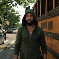 Punisher One Last Kill Jon Bernthal olive drab tactical zip hoodie featuring distressed battle details, bold chest graphic artwork, and military-inspired streetwear design