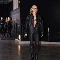 Sophie Cunningham Portland Fire vs. Indiana Fever black leather bomber jacket with shirt collar and hidden front zip closure