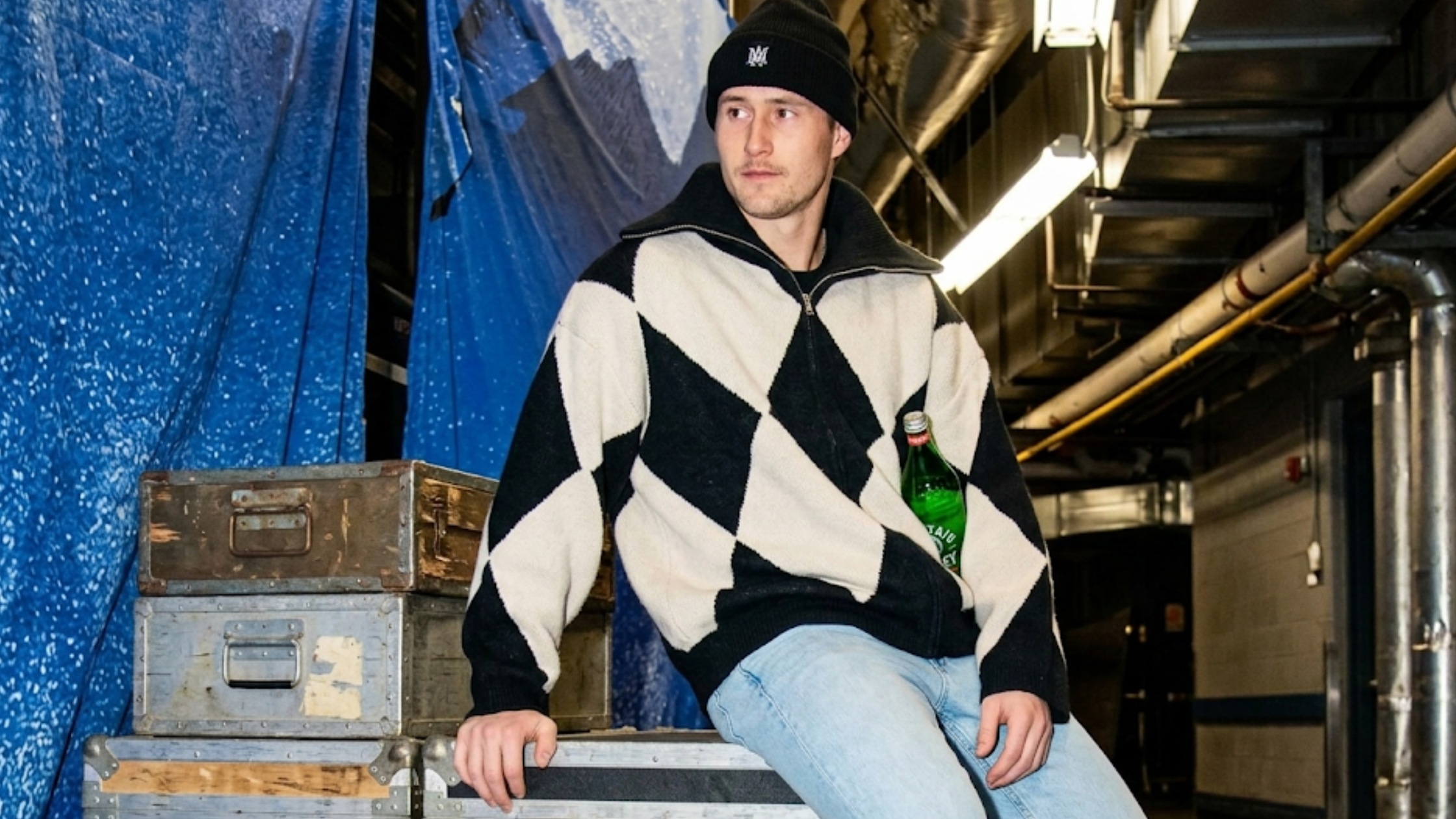 Martin Necas Colorado Avalanche black and white argyle zip-up sweater jacket with oversized fit and wide fold-down collar