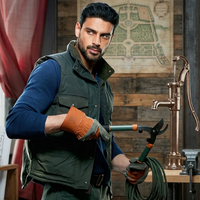 Michele Morrone The Housemaid 2025 green technical quilted utility vest with funnel collar and multi-pocket design
