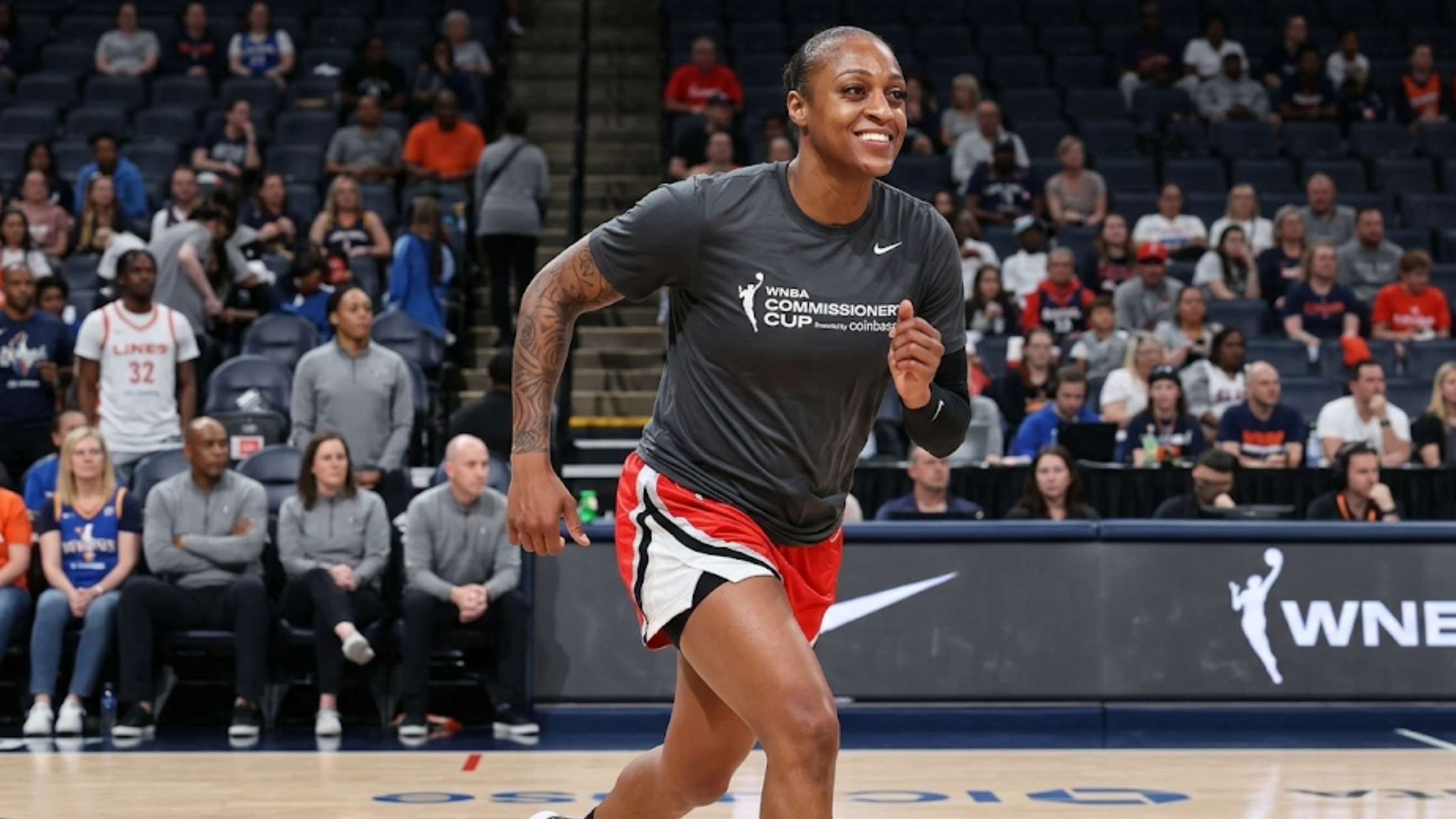 Tiffany Mitchell 2025 WNBA Commissioner’s Cup charcoal grey Nike T-shirt with official tournament branding and short sleeves