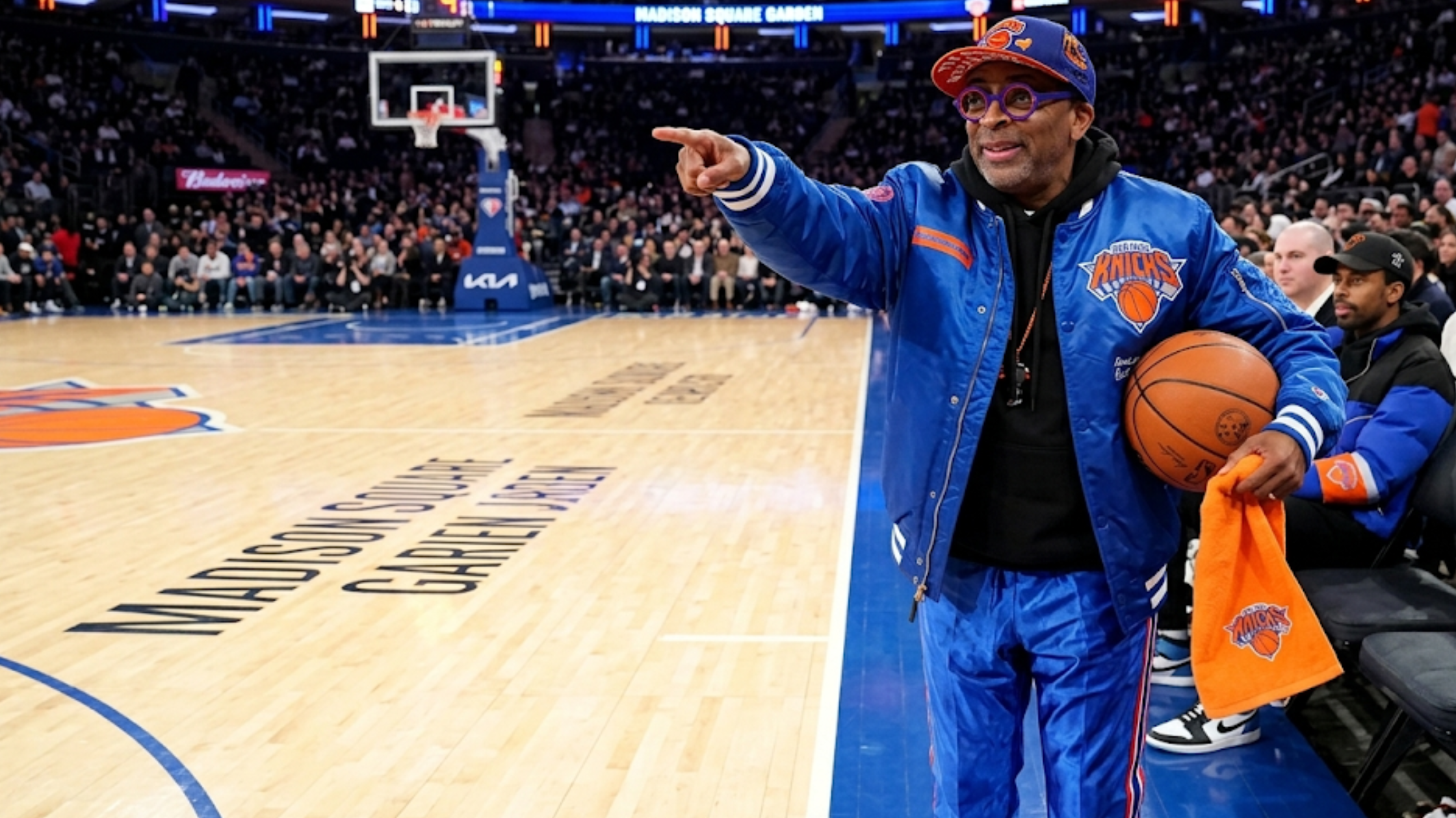 Spike Lee Emirates Cup Semifinals 2025 royal blue satin bomber jacket with New York Knicks chest logo and MA-1 sleeve pocket
