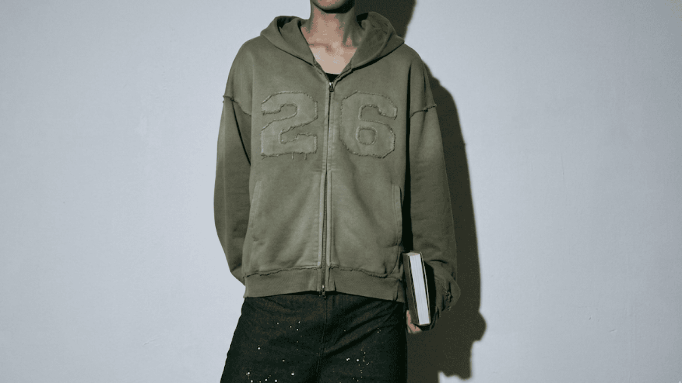 BTS Arirang World Tour deep green fleece zipper hoodie featuring a structured hood, front zip closure, and athletic ribbed cuffs.
