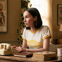 Euphoria S03 Lexi Howard Laurel Canyon Tennis Club ringer T-shirt with mustard trim and vintage graphic design