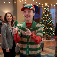 Violet Wilner crochet striped shirt with forest green, cream, and crimson layers styled with bold retro accessories in Mistletoe Murders S02