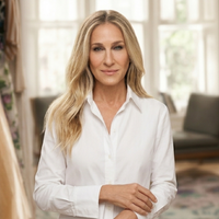 And Just Like That Sarah Jessica Parker white oversized shirt styled as effortless New York chic fashion with modern tailoring and elegant drape