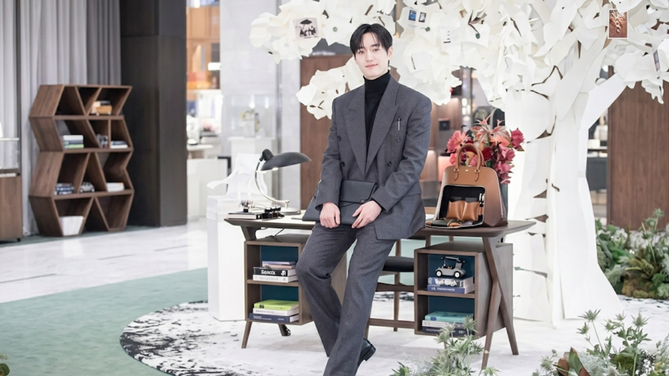 Seo Kang-Joon Montblanc Lifestyle Brand Pop-Up Store 2026 double-breasted grey tailored suit with peak lapels and relaxed-fit trousers