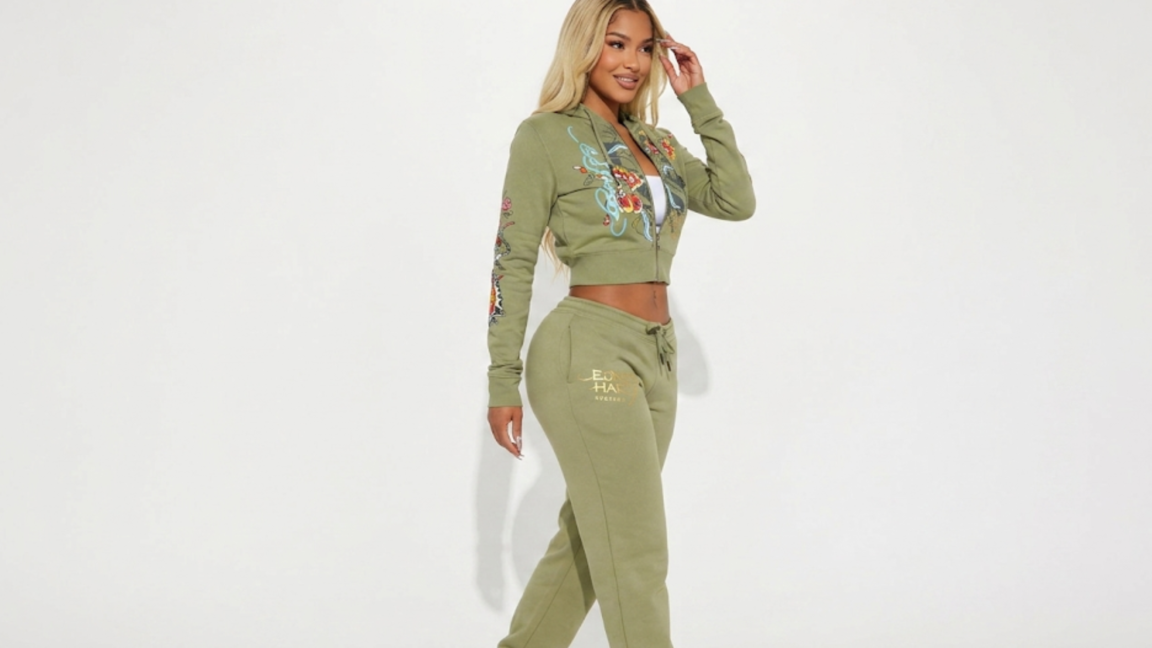 The Chi S08 Butterfly Ed Hardy inspired olive green cropped zip front hoodie with tattoo graphics and Y2K streetwear aesthetic