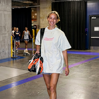 Sophie Cunningham 2026 WNBA Commissioner’s Cup oversized white graphic T-shirt styled as modern streetwear with relaxed fit and game-day inspiration