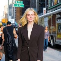 Elle Fanning SAG-AFTRA Foundation Conversations espresso brown pinstripe structured power blazer with vertical tailoring and Hollywood-inspired elegance