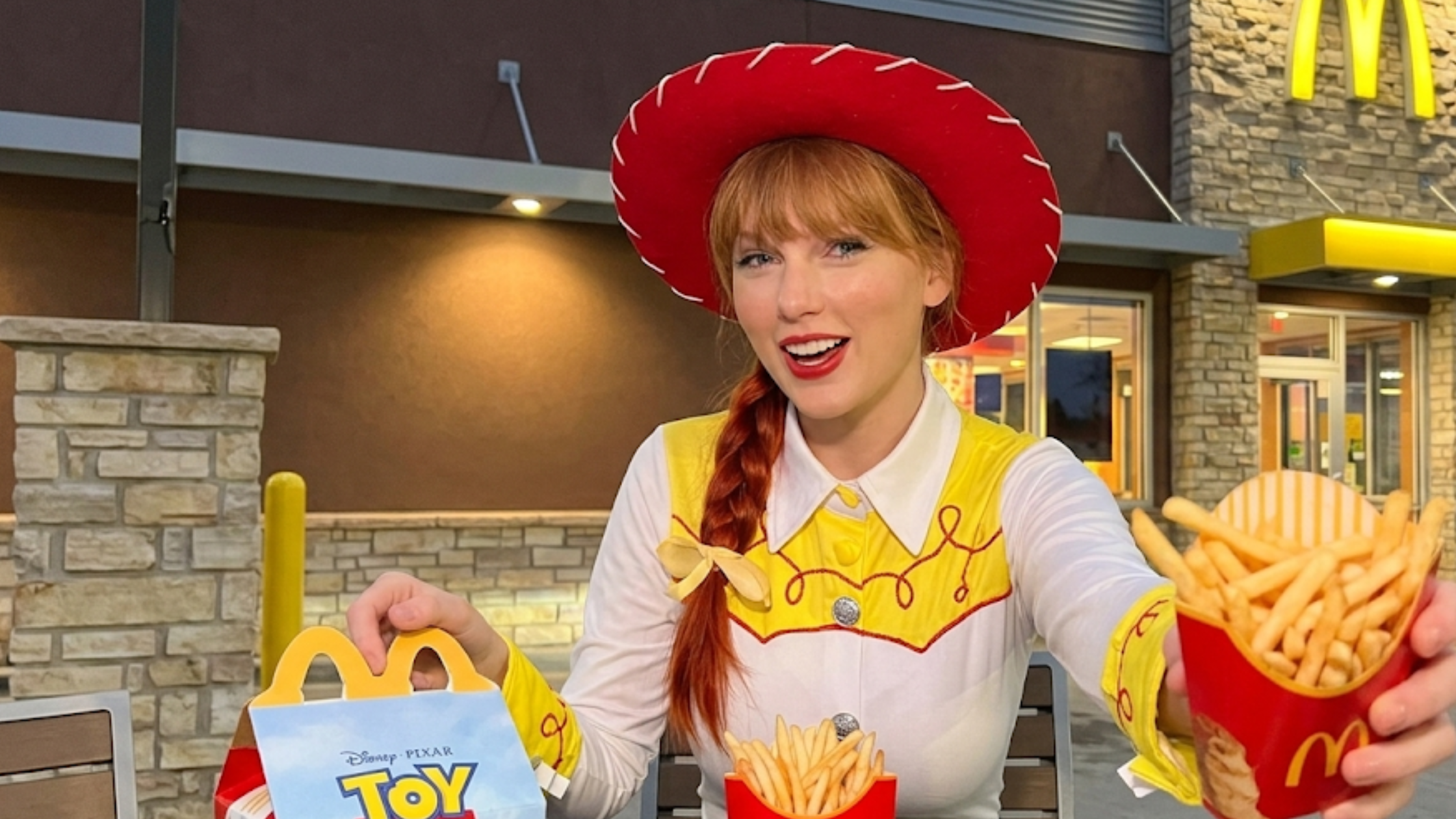 Taylor Swift X Toy Story Jessie western shirt featuring a white body, yellow embroidered yoke, red swirl detailing, oversized yellow cuffs, and classic cowgirl-inspired design.