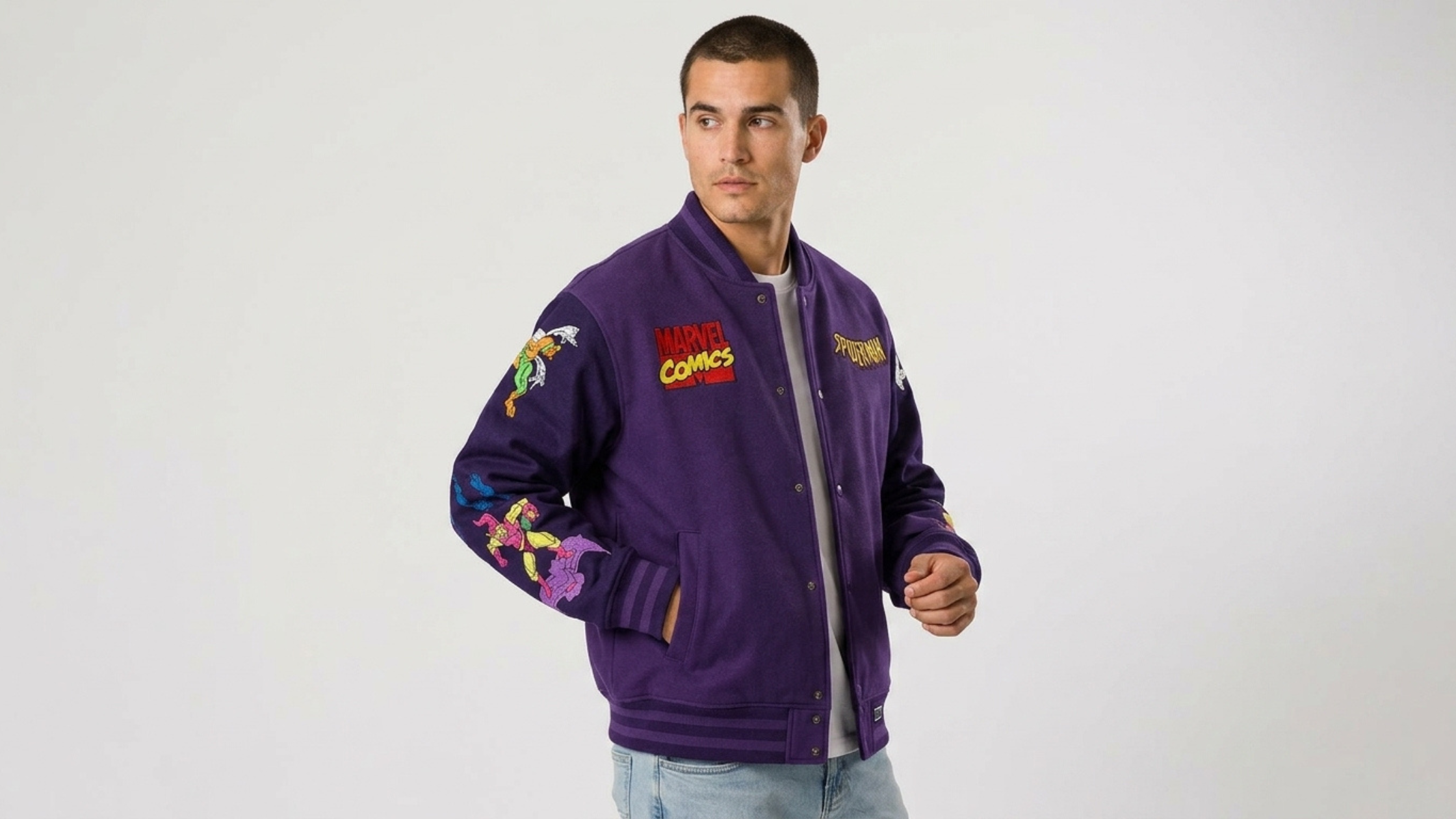 Spider-Man 90’s Varsity Jacket in deep purple with Marvel Comics patches and colorful character graphics